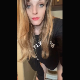 A pretty blonde girl records herself taking a hard, chunky shit from an under the ass perspective while bending over in front of a toilet. Presented in 720P vertical HD format. About a minute.